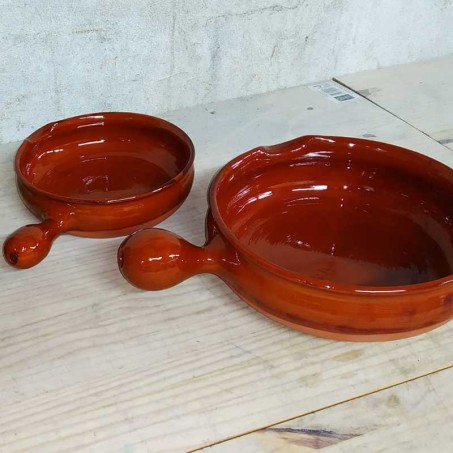 Large terracotta skillet pan and French clay pots from Vallauris